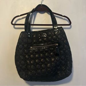 Black puffer quilted Kate spade spacious shoulder bag with purple interior